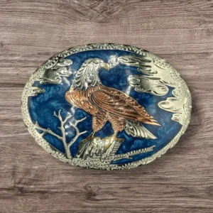 Silver Toned Belt Buckle with Bald Eagle perched on branch Blue Background