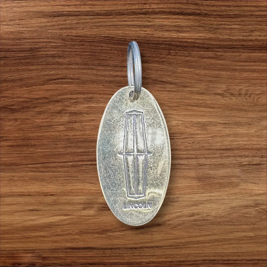 Vintage Brass Lincoln Keyring